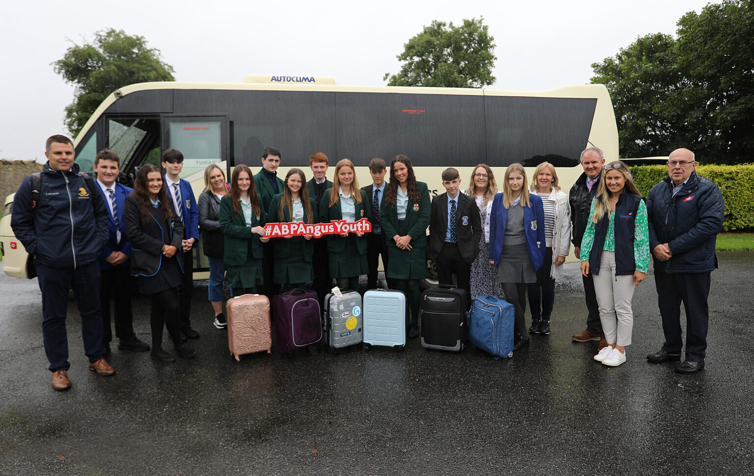 Students participating in the ABP NI Angus Youth Challenge pictured with ABP Staff members in front of a bus